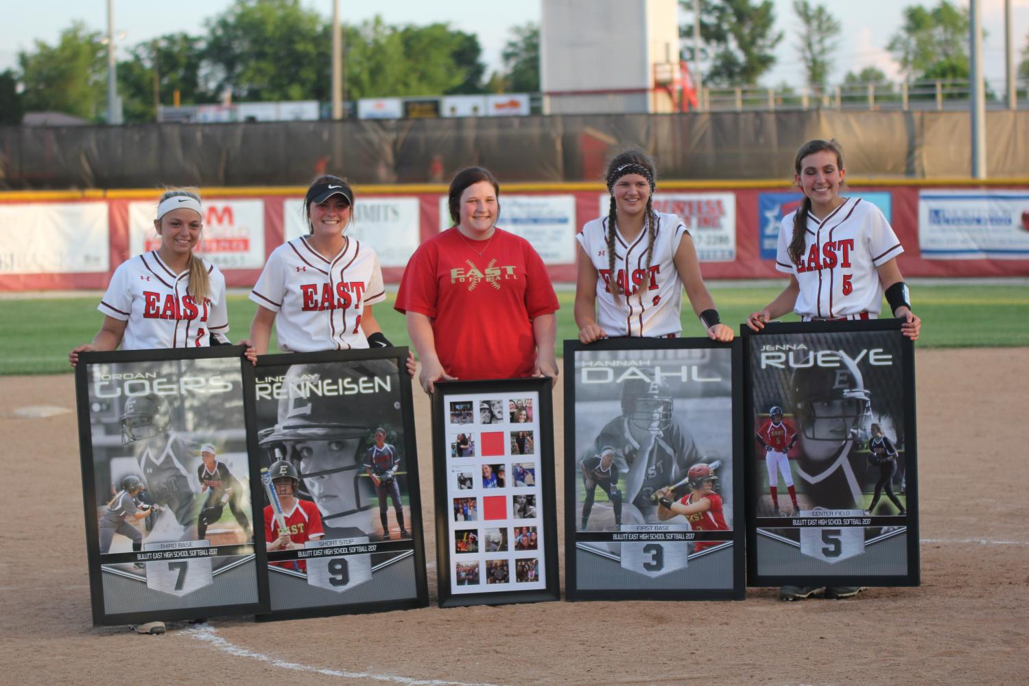 The four Bullitt East softball seniors and senior team manager Karlee Hoffman after the game against Atherton. 