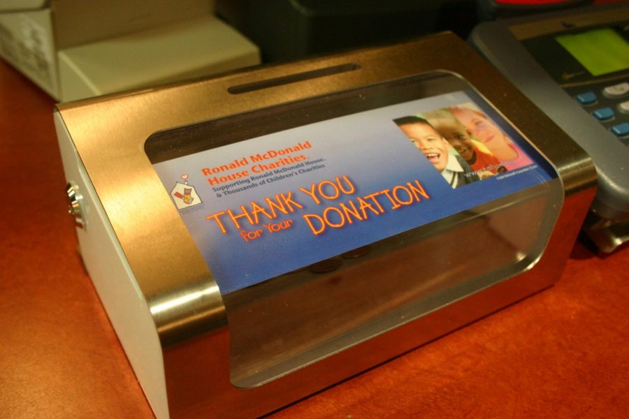 A Ronald McDonald House Charities donation box at a restaurant. 