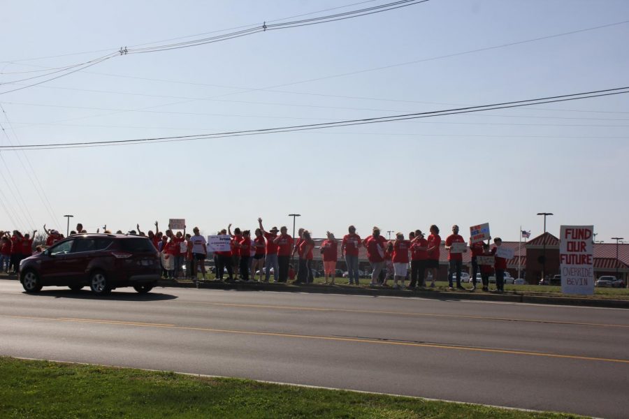 Local public education funding supporters rallying outside of Roby Elementary School.