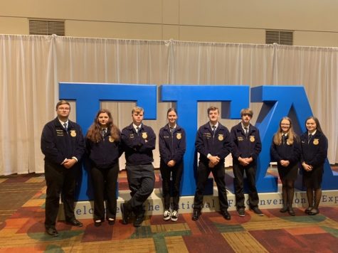The members from the Bullitt East and North Bullitt FFA chapters who attended the trip line up next to the FFA sign in the entrance of the convention. They were able to meet fellow FFA members and attend workshops to grow their leadership skills. “The workshops that I attended while on the convention showed me how to stop outside of my box and talk to new people while also becoming a leader when needed,” said junior Madi Wilhite.