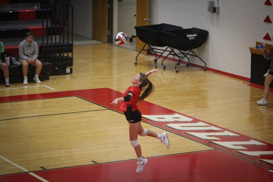 Junior Torrie Frist serves the ball in the second set against Bullitt Central. When I play volleyball its the best feeling ever. I have been playing for about 11 years now and everytime I step on the court I still get excited to play, Frist said.