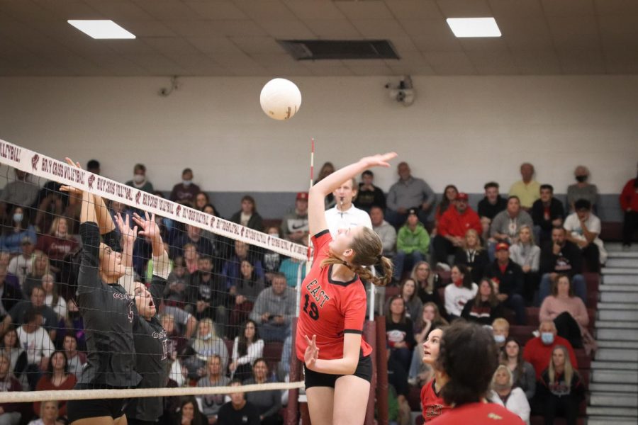 Sophomore Kate Cissell uses her height to jump up above the net and attack the ball. Being able to attack the ball and get a flashy hit is great and all but I could literally never do it without the passers and setters, Cissell said.
