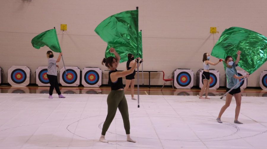 The team practices their latest work to prepare for their first show. The team has prepared with multiple practices earlier in the season to improve their work. We really just want to make sure we get our work perfect before we perform, junior winterguard member Skylar Braden said. 