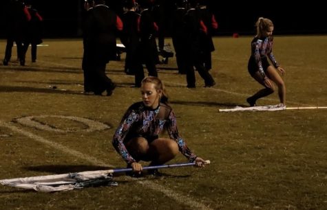 The band plays their best at their performance. At their most recent competition, the band placed first in their class. “It was really exciting for easy, even if it was later in the season,” senior color guard member Ellen Bray said. Photo Credit: Raegan Jackson