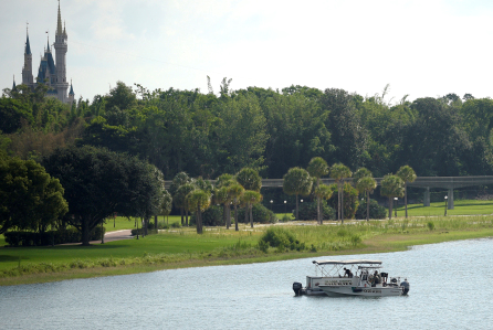 Orange County Sheriffs search for the young boy Wednesday with Magic Kingdom in the background. 