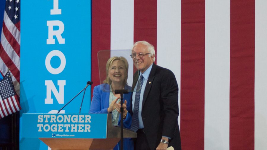 Bernie Sanders & Hillary Clinton https://www.flickr.com/photos/marcn/28284448335/   

Marc Nozell https://www.flickr.com/people/37996583933@N01  

Creative Commons Attribution 2.0 Generic License https://creativecommons.org/licenses/by/2.0/legalcode