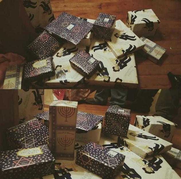Presents from Gividens family to herself wrapped in Jewish paper, as her family calls it. 