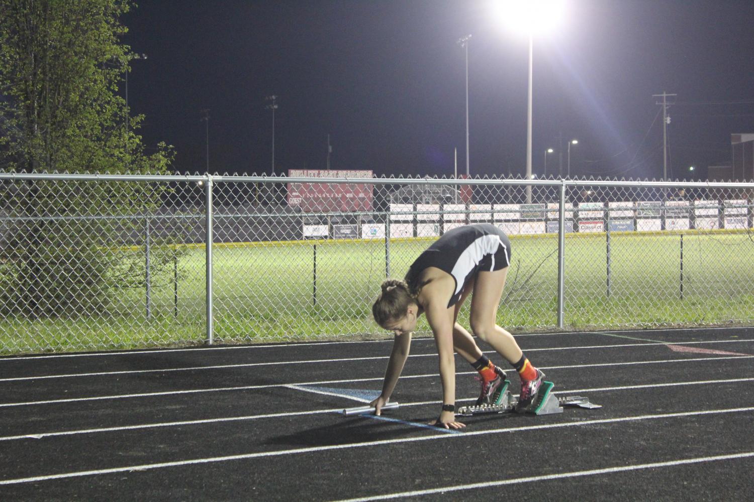 Senior Lauren Masden gets ready for one of her races at Bullitt East. Picture Credit: Haley Grether