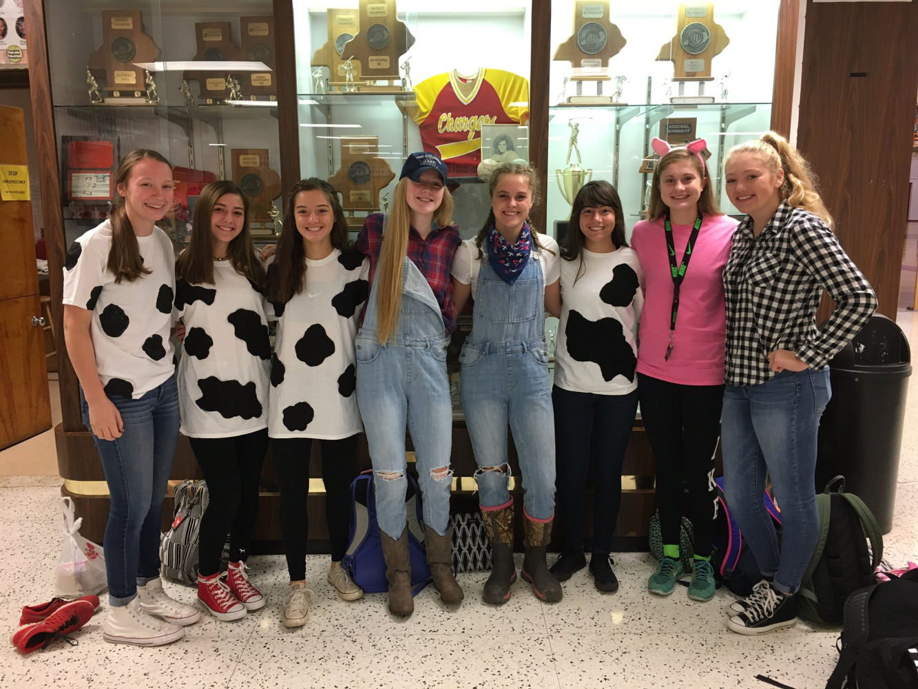 Freshmen Caroline Scott, Lexi Star, Selena Granado and Alana Pierce,  sophomore Kennedy Griffin, juniors Emmy Ralph and Allie Rae Thompson and senior Kathleen Scott dressed up for Monday's homecoming theme, farm day.