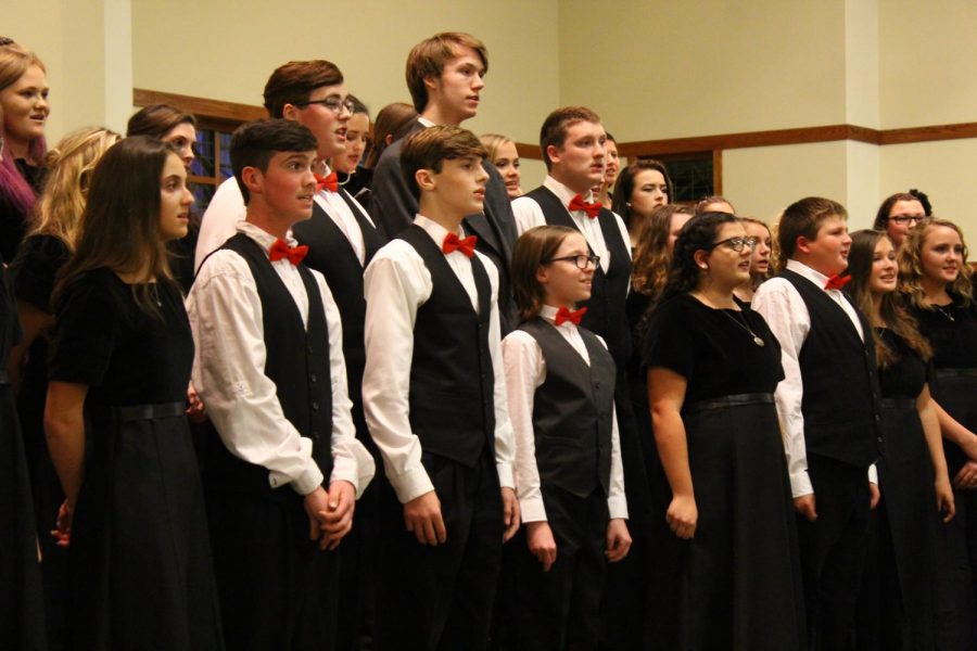 Concert choir takes the stage during the Monday night concert.