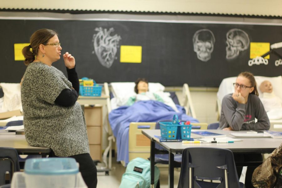 Students listen to Godbold during Acute Care Basic Skills class.