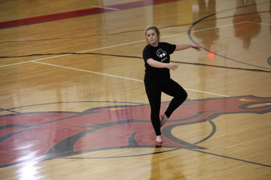 Sophomore Whitney Fox performs an improv modern dance piece to Cringe.