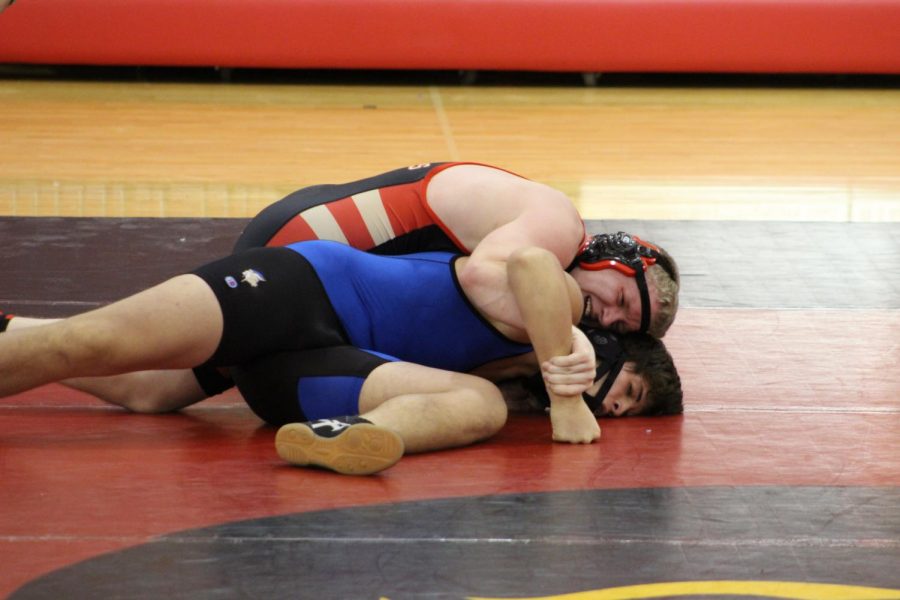 CJ Bynum taking down the opponent last week at the home meet.