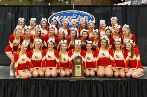 Bullitt East cheerleaders posing for a picture after winning state.
