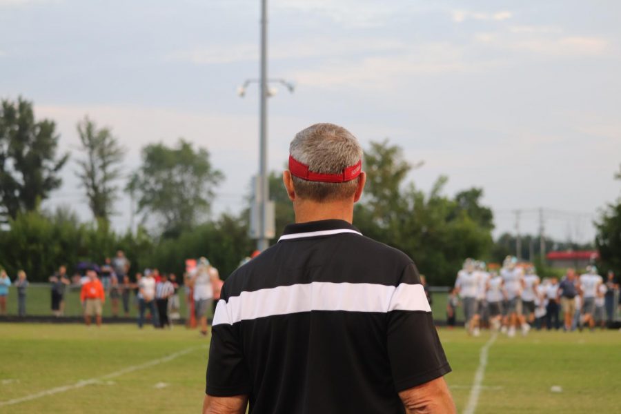 Coach Sander, along the sidelines, at the home game against Central Hardin.