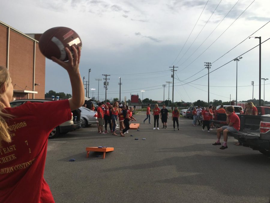 Before+the+first+football+game%2C+students+gathered+in+the+parking+lot+for+the+first+Redzone+Rowdies+Rally.+