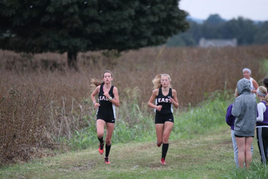 Freshman Mia Maguire and Sophomore Emily Tinelli are running into the next cross-country season.