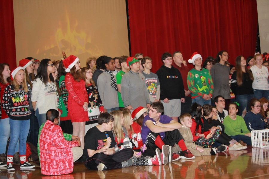 The choir sings at the houses for the holidays. They sang Christmas carols along with Project Unify. 