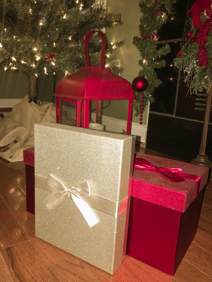 Gifts are placed under the tree in preparation for gift exchanges. 