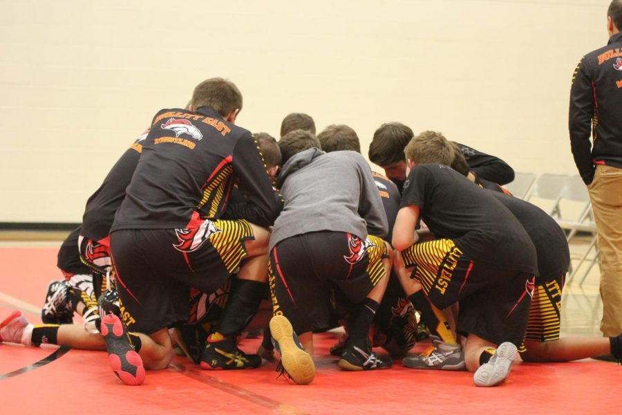 The wrestling team prepares for their upcoming match against Taylor County High School on Jan. 9. With the team as a whole in need of improving their rankings, the successes of individual members have demonstrated how hard each team member has been working to better their abilities, and with this sport already being time-consuming and challenging in itself, their efforts have been especially acknowledged. "Wrestling is a very tough and demanding sport, which requires strong dedication and commitment," said wrestling coach Tom Wells.