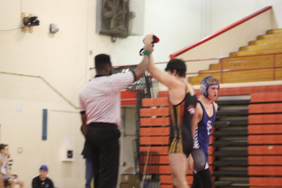 Senior James Nash is victorious in his duel against his Spencer County High School opponent on the senior night home match on Jan. 23. Successes by seniors on the wrestling team like this one reflect the especially hard work they have endured this season, not only to embrace their last opportunity to become a Regional Champion and/or State Place winner but to serve as an example for underclassmen on the team, so they will be inspired to train and prepare equally as vigorously, although most younger members have already done so independently of older role models. "My original reason [for joining the team] was to win and make myself better, but it changed. My new motivation is to inspire others and make others better, and not only my team but others as well," said senior Patrick Netherton. 