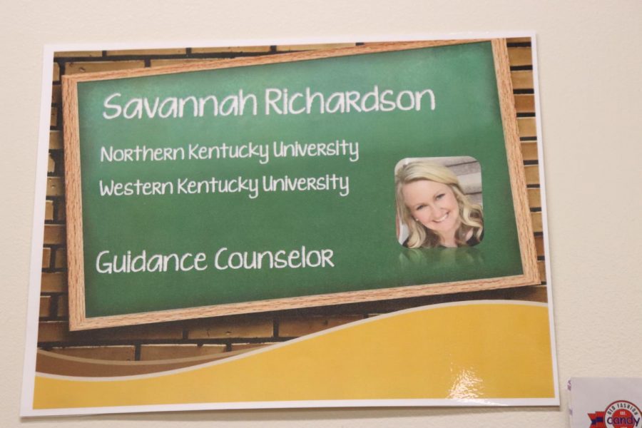 Richardsons guidance counselor sign out side of her office. She presented to english classes in the library for everyones scheduling needs.