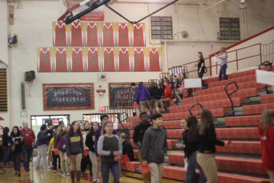 Eight grade students walking in to visit Bullitt East.