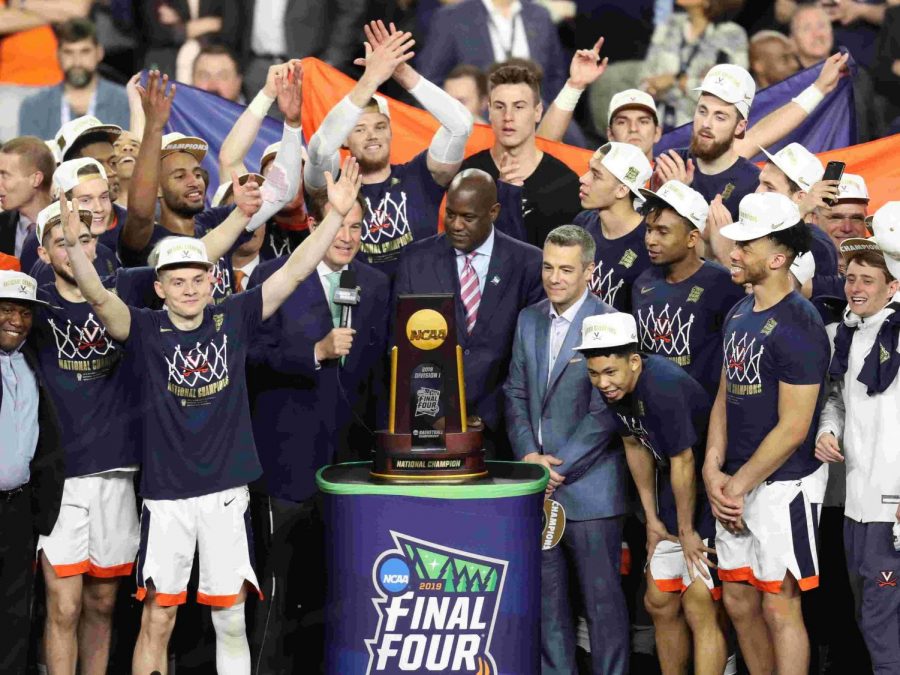 The trophy presentation to the Virginia Cavaliers as they celebrate their win. The Cavaliers defeated  Texas Tech in the championship game on April 8th. 