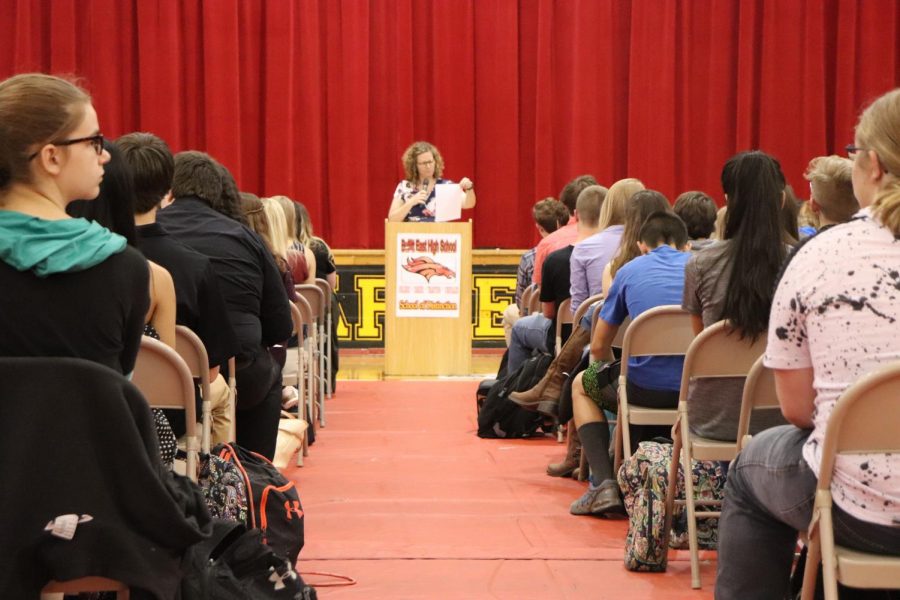 Guidance Counselor Dana Steinmetz announces awards for academic achievement.