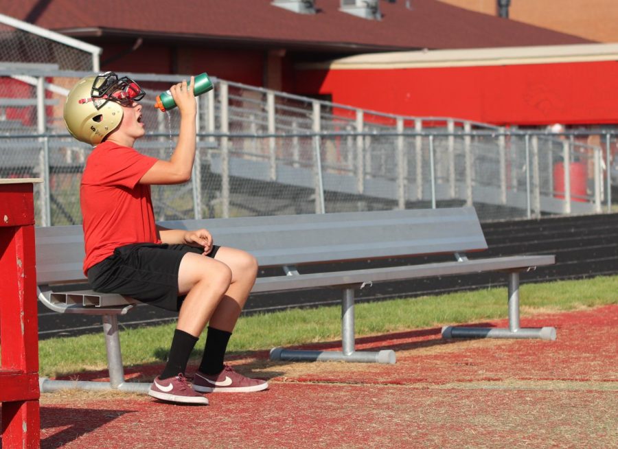 After a two hour practice, sophomore Ethan Taipalus takes a water break. The football coaches have stressed the idea of proper hydration this season due to dehydration issues in the past. Staying hydrated has been really important to us this year especially with all the heat lately. Ive tried to keep water with me most of the day to make sure im ready for practice, said Taipalus. 