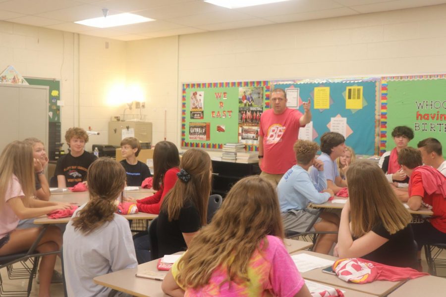 Algebra teacher, Jason Couch prepares his  incoming students by explaining his expectations for them. This class was his fifth period class in which students were listening to his instructions intently. What I am most excited about for high school is all of the pathways and opportunities I will have, said Lily Beswick.