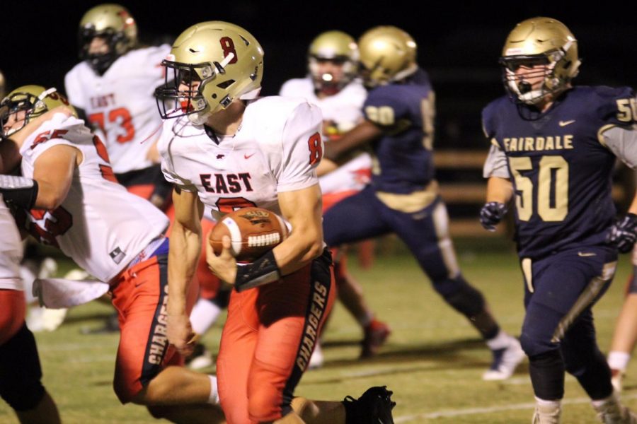 Quarterback Aaron Adams takes it down the sidelines for a first down. Adams finished with five touchdowns in the game. We played good as a team, I dont take credit for things I do, it was a team effort, said Adams. 