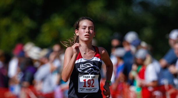 Sophomore Mia Maguire has her eyes set on the finish line during the 2019 Tiger Run. Maguire finished 71st out of 238 runners. I was somewhat disappointed with my time and performance this weekend but we have a race tomorrow and im excited to come back, train harder, and make my teammates proud, said Maguire. 