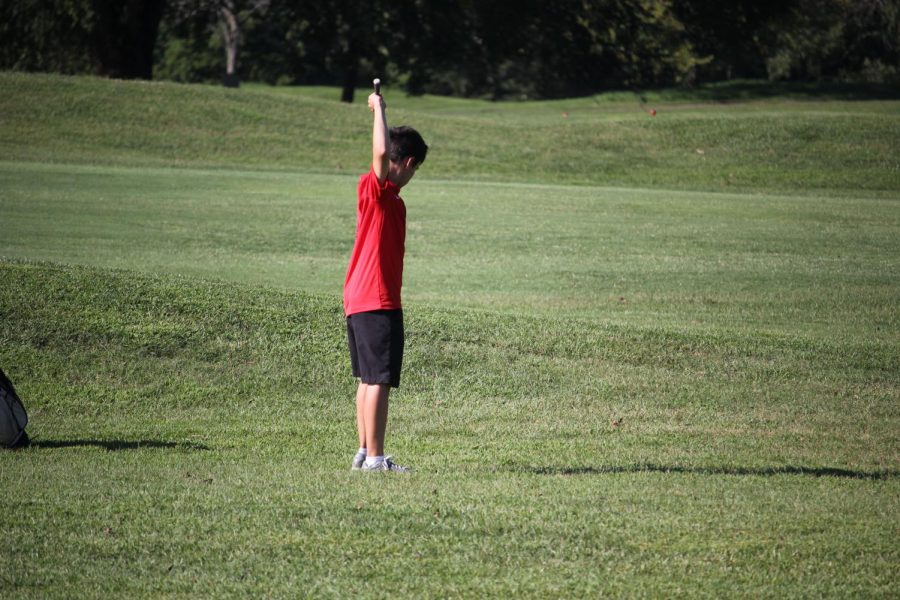 Sophomore Austin Hale studying golf course for the next hit. Hale was soon about to  place fifth at Quail Chase Golf Course, and break his all time best record. “Hey, make sure you write this down: make sure to have fun,” said Hale.