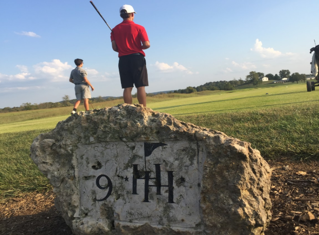 Senior Aiden Robison getting ready for ‘Hole 9’ at the Heritage Hill Golf Course against Grayson County. Robison did not do too well for the final hole of the Sept. 11 golf match. “I hit my first shot in the bunker on the right, and then I hit that about ten yards, and then I hit that ball into the hazard left, and then I had to drop, and then I got that on the green, and then two putted. I think the reason for that is I turned around and saw Downs’ shoes, and ate fareway, and I just get such an angry feeling whenever I see those, (jokingly said that), and I just can't humanly explain it, and I feel like that is the reason I doubled mine,” said Robison.