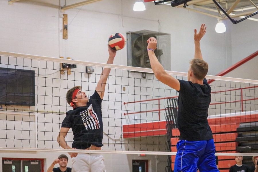 Senior Clay Prechtel scoring the final point against the juniors in the championship game. The seniors won the match in the third set and took home the trophy. "We struggled early every game but we were able to focus once crunch time started and get the job done," said senior T.C. Etherton.