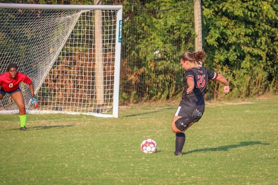 Senior captian Brooke Montauge scores during game against Butler.