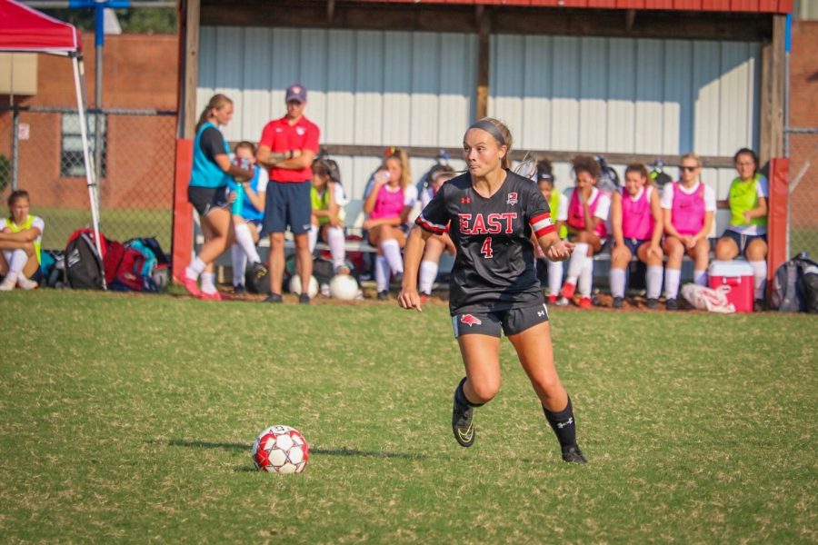 Looking down the field, Senior Captain Tayler Mahoney controls the ball. Mahoney recently made both goals for the team against Bardstown, who they fell to with a final score of 3-2. "Scoring is always an exciting feeling. Not only do you put a point on the board, but you also help boost the confidence amongst your team," said Mahoney. 