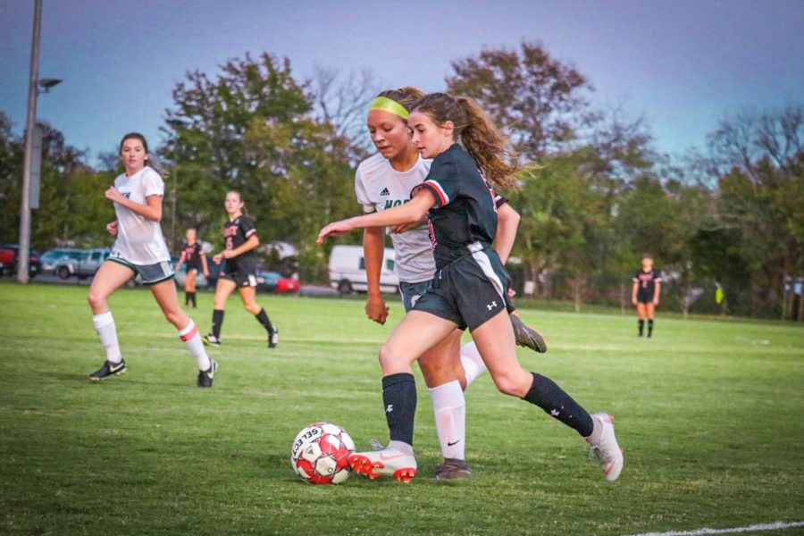 Junior Emma Wright moving the ball up the field. Wright was selected for the 6th Region All-Tournament Team.  I’m proud of us coming back even stronger than last year and winning the region again. We had a great run this season and a better record than seen before. I’m also super proud of the unity we’ve had as a team. There’s never a moment when I don’t feel like I’m not just hanging out and having a good time with a group of friends, said Wright. 