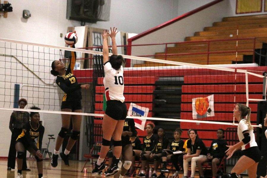 Clemens goes up to block a hit from a Central player. The team won their game against Central 3-1. Clemens said, "I am very ready and very excited for post season."