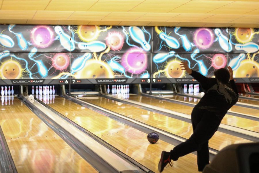 Senior Dylan Young bowling one of his many streaks, the night of Dec. 18. The bowling team played a match against Pleasure Ridge Park High School, at Dixie Bowl, and won with five out of the seven possible points. “I think it (the match) went pretty good, since we won; since we used to not be able to be as good as them, but I think it went pretty good,” said Young. 