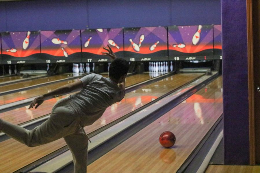 Sophomore Austin Hale rolling his ball down the lane, at practice. Hale, and the rest of the team, went to Fern Bowl for a practice on Thur., Dec. 12, after their loss against DeSales High School. “We are going to improve by practicing more, and calming down mentally, because some of our team members have a really short fuse, and you only bowl worse when you’re mad,” said Hale. 