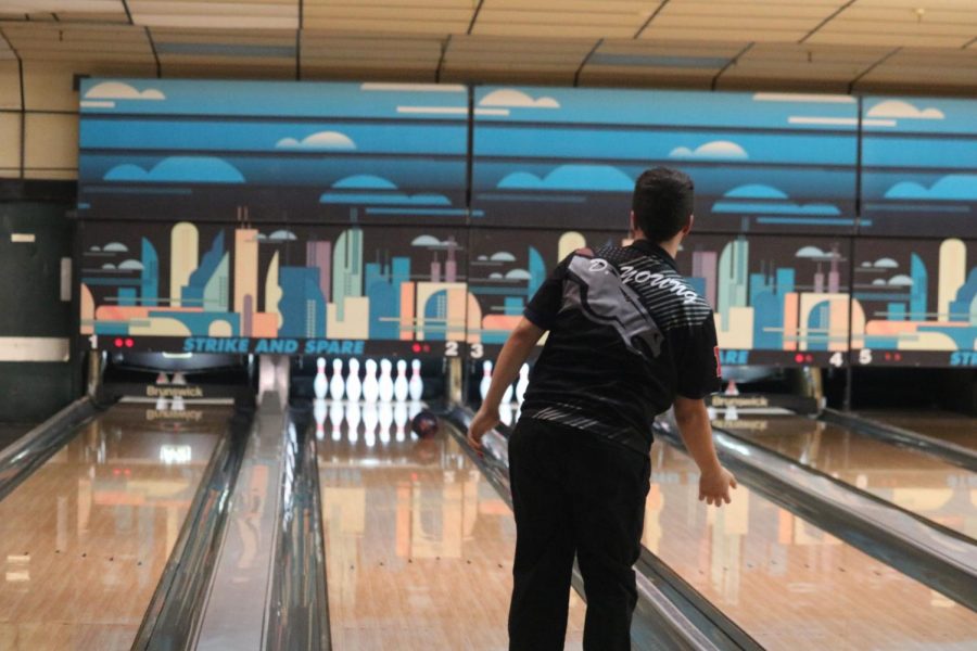 Senior Dylan Young bowling his last normal ‘team v.s. team’ match as a bowler, on the Bullitt East Bowling team. All bowlers experienced their last match of this season, with a win, Jan. 15, against Moore High School. “I mean, I love bowling, it’s like one of my passions. It’s just something that I seem to be pretty good at, and it just sucks that I won’t be able to bowl with my team again,” said Young.