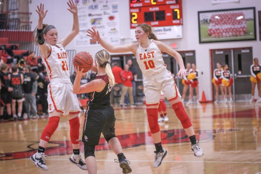 Attempting to block the pass, senior Caroline Scott and sophomore Emma Egan jump up to try to take possession of the ball. Despite the Lady Chargers blowing out the Lady Cougars, the girls are always looking for ways to improve their offense and defense."These components will help us advance past the upcoming pressure against our rivals, Butler and Mercy," said Egan.
