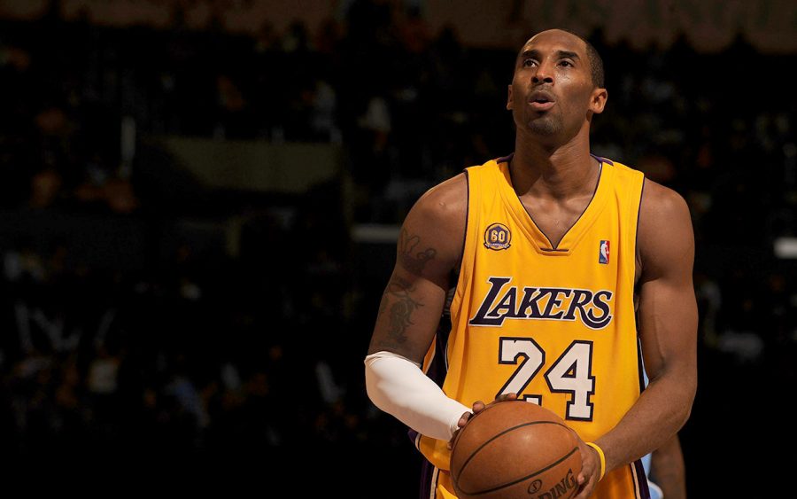 Kobe Bryant lines up for a free throw in his final game. He played for the Lakers all 20 years he spent in the NBA and won five championships. 