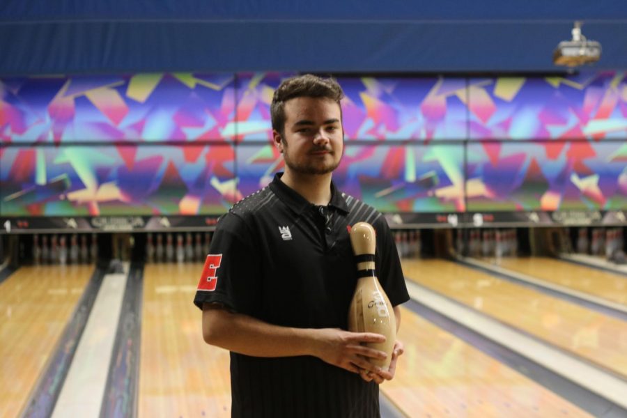 Senior Dylan Young holding the “300 Pin (Perfect Game)” trophy. At the Louisville City Tournament, Jan. 11, 2020; Young, senior Logan Parrish, junior Adam Young, sophomore Austin Hale and freshman David Scholtz, played a bakers match, and made history, and scored a perfect game, with 12 strikes in a row. “I think it (getting the 300 game) was pretty cool, considering I was the last person to complete that 300; is very stressful, you know, going up there shaking, taking deep breaths, inhaling, exhaling, trying to calm myself down. You know, it‘s just, for me, I was surprised I was able to do it,” said Dylan Young.