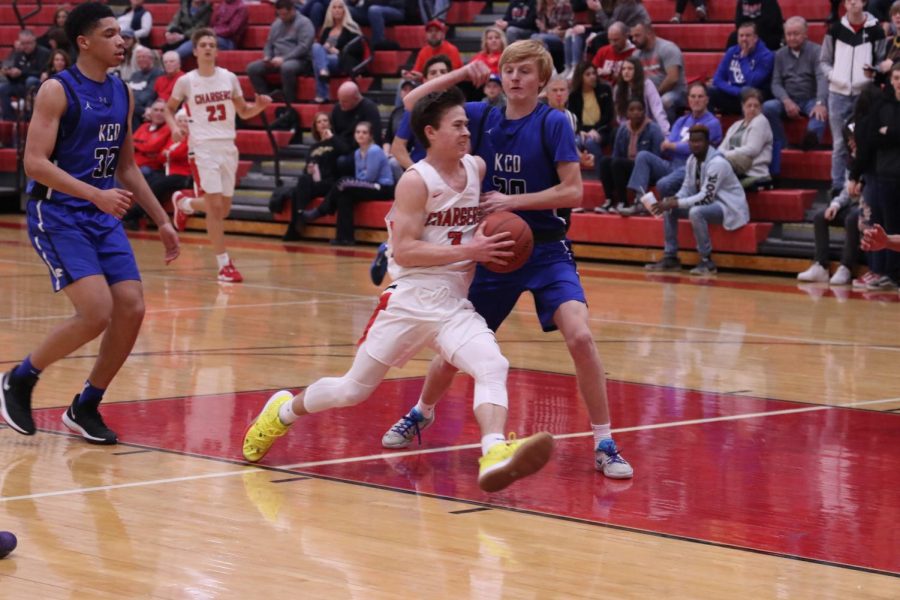 Senior Zak Perdew drives the ball to the basket during the Kentucky Country Day game. The Chargers won this game 81-52. Maki said, It feels pretty good to win a few in a row. We were expecting to do something like this early in the season, but it took a little bit more time than expected. Were here now and ready to make another run just like last year.