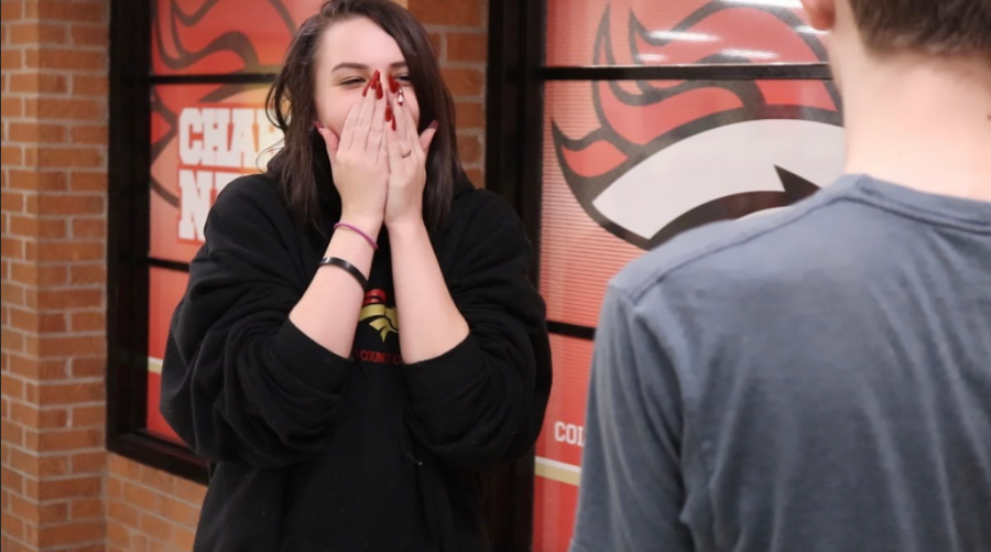Junior Freya Cook putting her hands over her face out of shock for being fooled from the magic trick. Feb. 11, Cook was asked if she wanted to see a magic trick; she did, and therefore, she had no idea how what happened was possible. “I was really fooled, because I didn't understand how you let me count a number, or find a number, and then you just go through the deck and count like that, and it's right there. Like, I don't know how you made it end up being right there. Like, it was exactly where I said,” said Cook. 