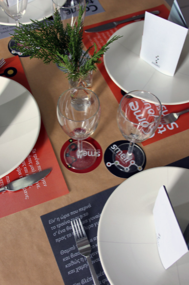 Plates being set out on a dinner table.