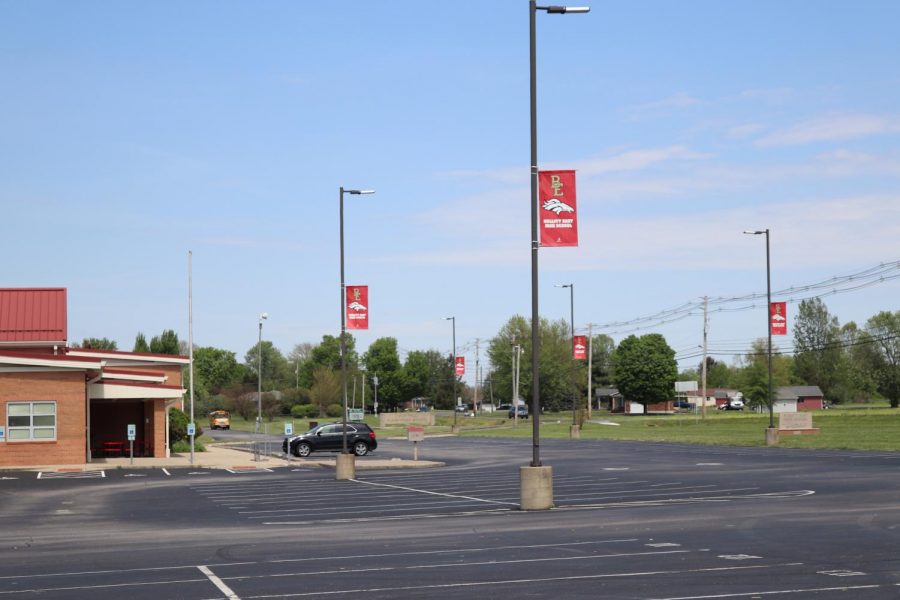 The empty school parking, where many seniors left on March 13 and couldnt return until their drive by. 